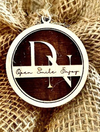 Circular cut gift tag engraved with Monogram in Baltic birch - The Red Door Engraving Company Inc.